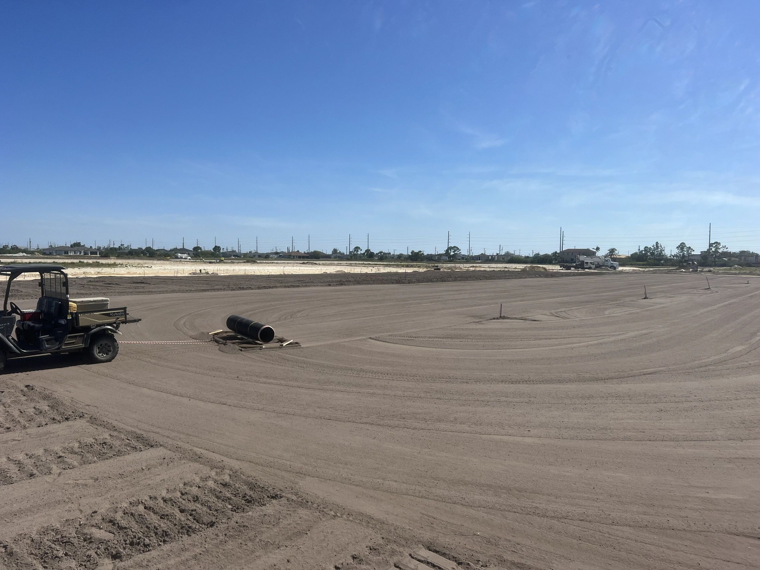 A graded land development site ready for construction